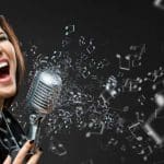 How to Sing Punk girl in black clothes singing into mic loudly